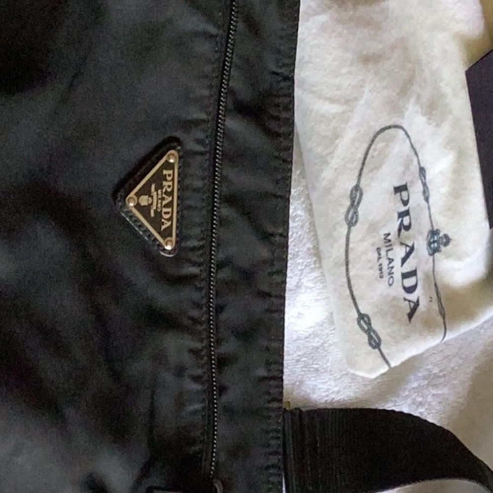 100% Prada Nero messenger bag